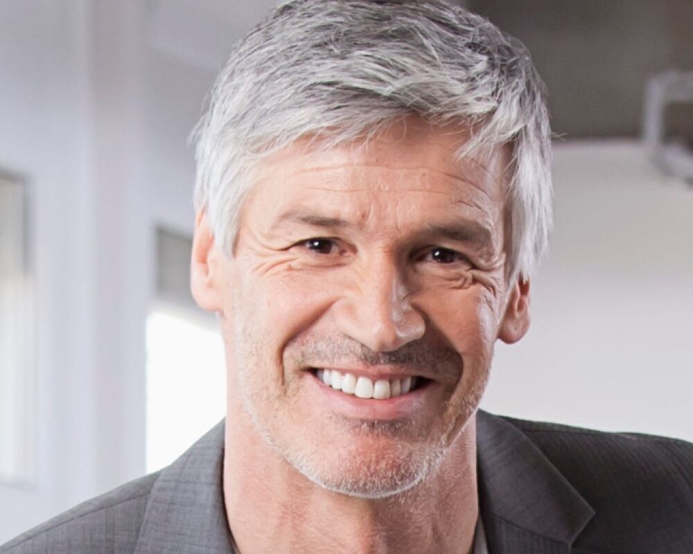 germany bavaria munich mature man smiling colleagu 4errb27.jpg